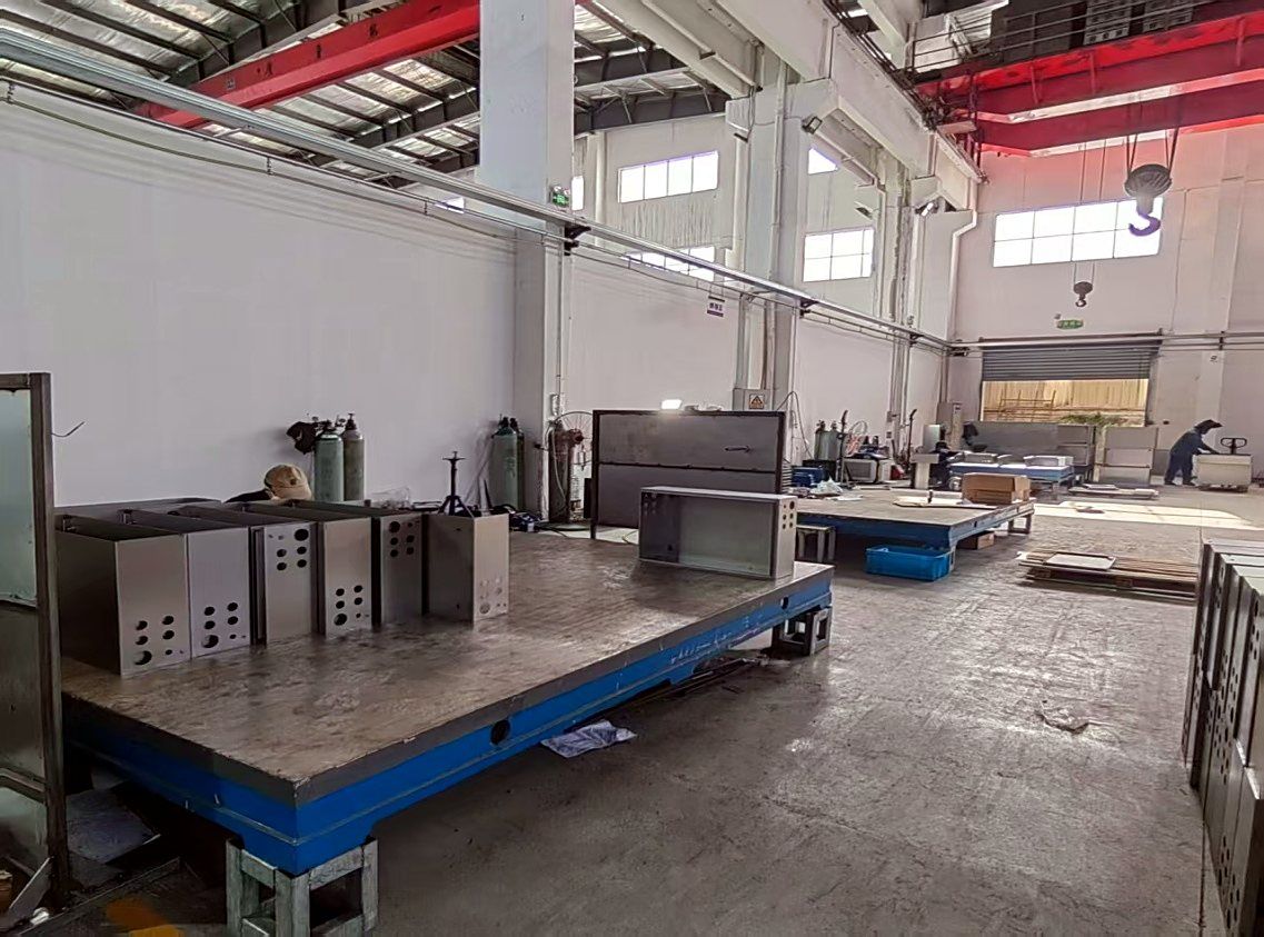 Sheet metal workshop producing cabinet panels