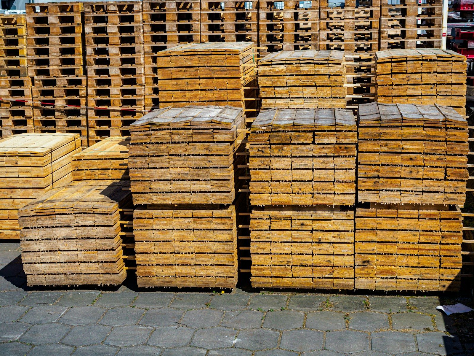Stacked wooden shipping pallets
